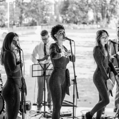 Vancouver band The Dimes posing with instruments