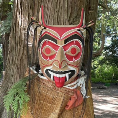 Vancouver First Nations Mask Carving - red mask with blanket