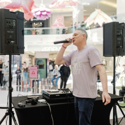 dj bfad emceeing a family event in vancouver
